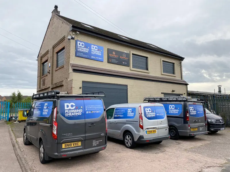 DC Plumbing & Heating vans outside the company office in Stoke-on-Trent