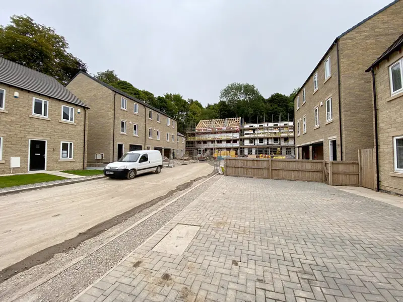 Street of new build stone houses on a housing development